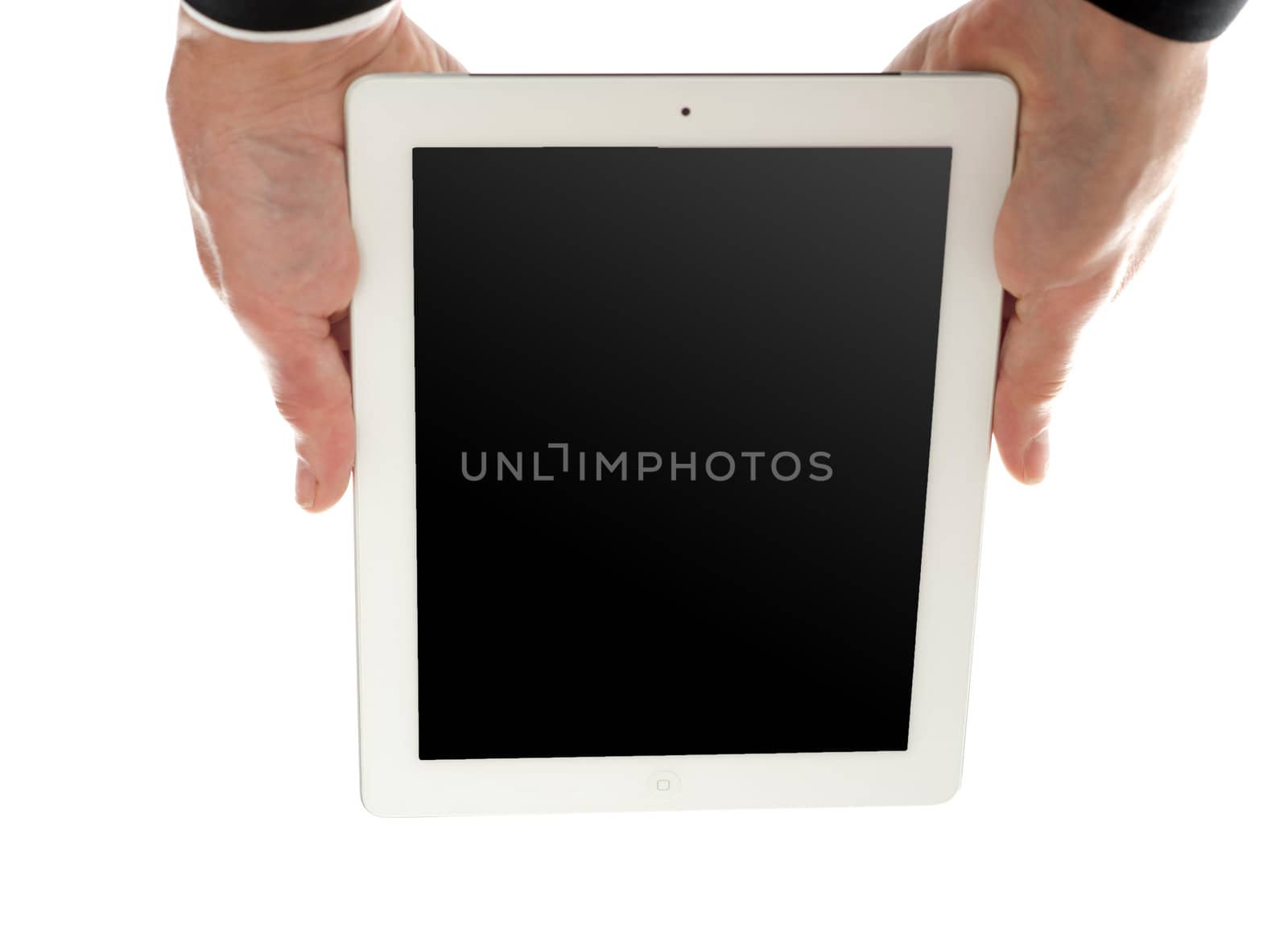 Man holding tablet device upside down isolated over white background