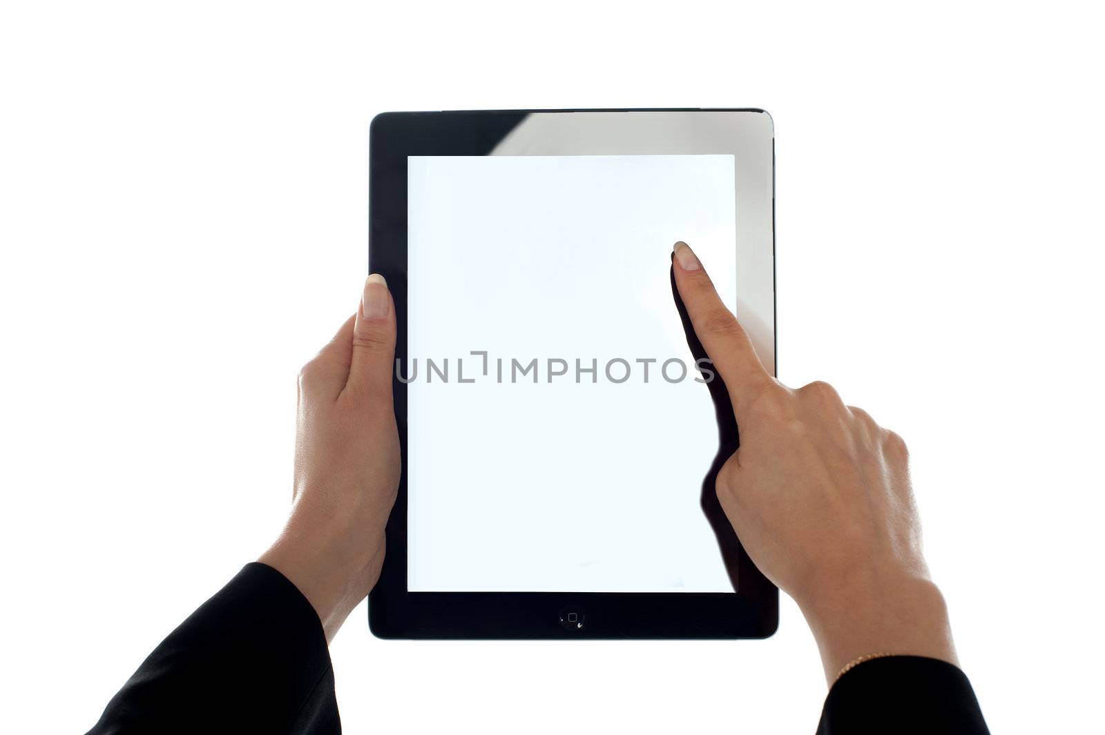 Closeup shot of female finger operating tablet. All on white background