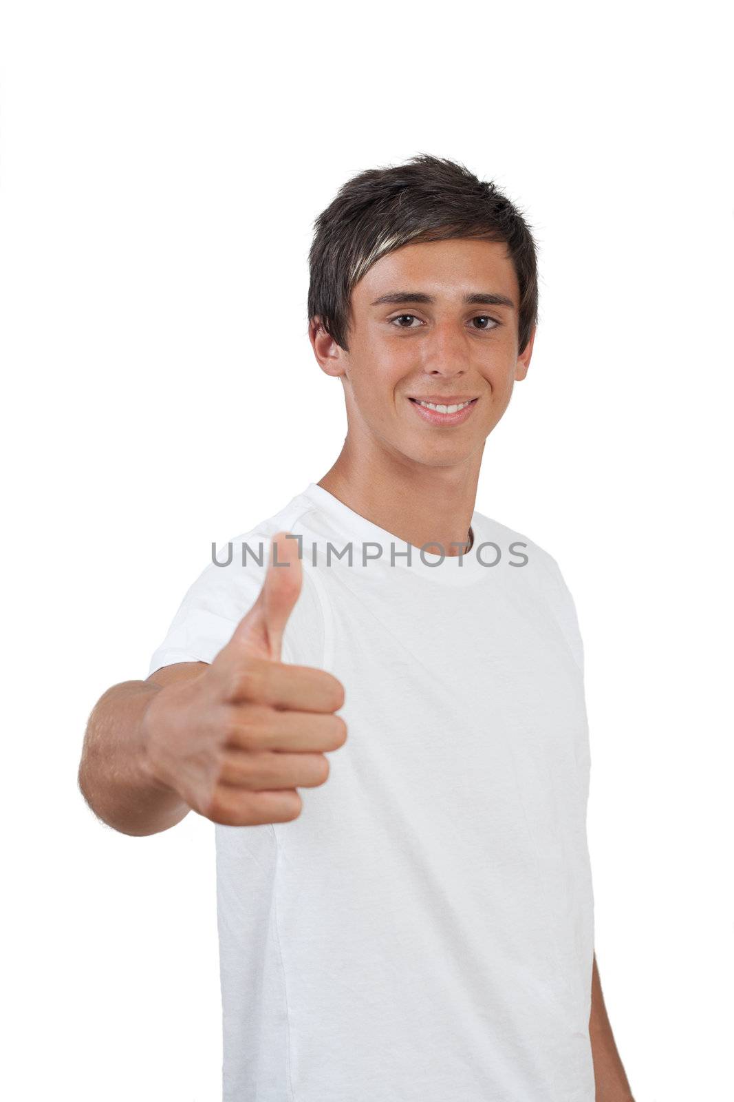 young swarthy man with brown eyes gives the thumbs up gesture on white background