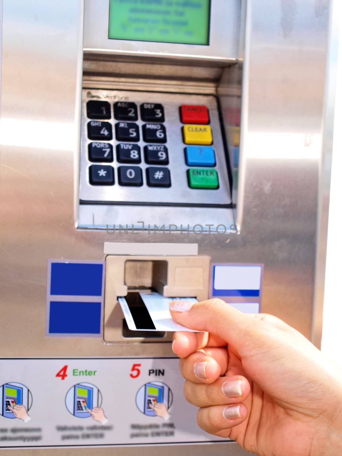 Person inserting, removing a card from ticket vending machine by Arvebettum