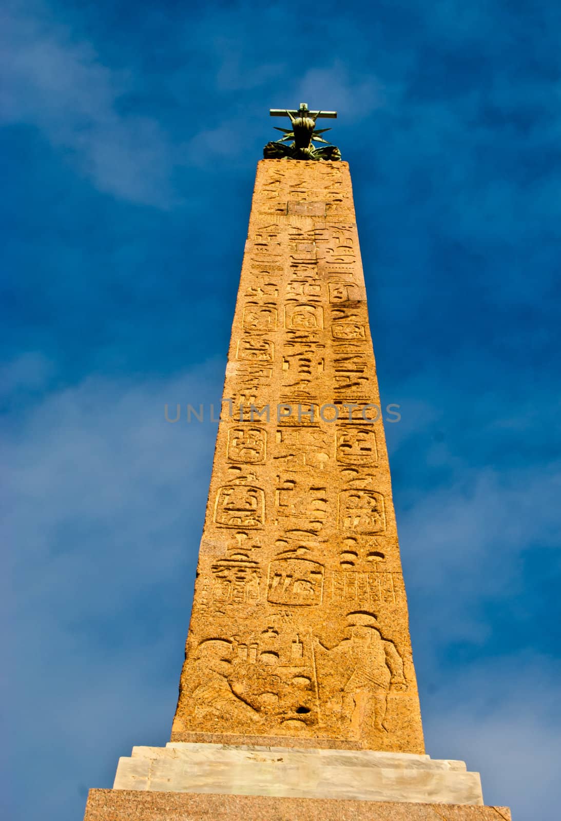 egyptian obelisk against a cloudy sky in Rome