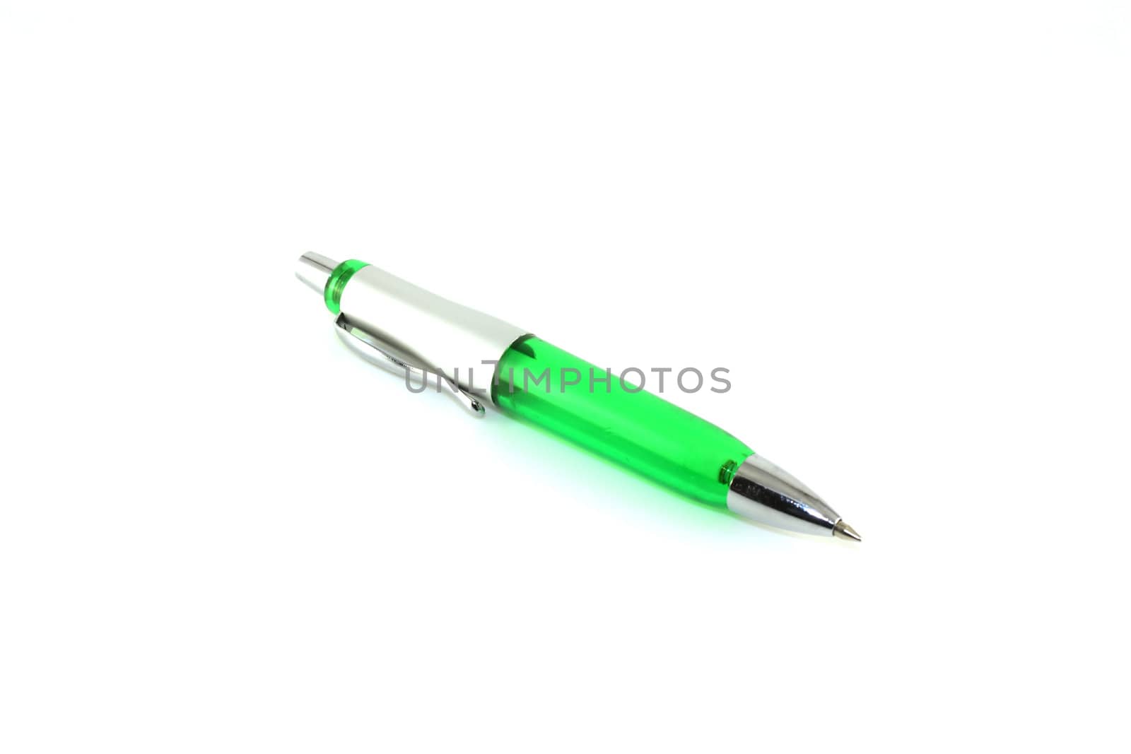 Green ball-point pen over white