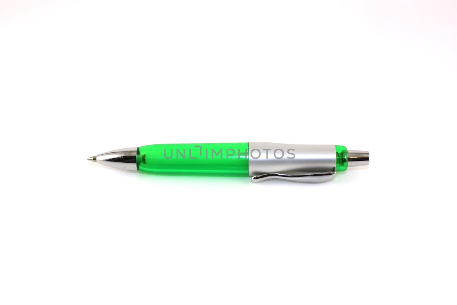 Green ball-point pen over white