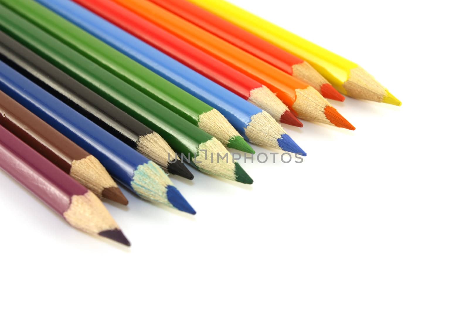 Color pencils over white