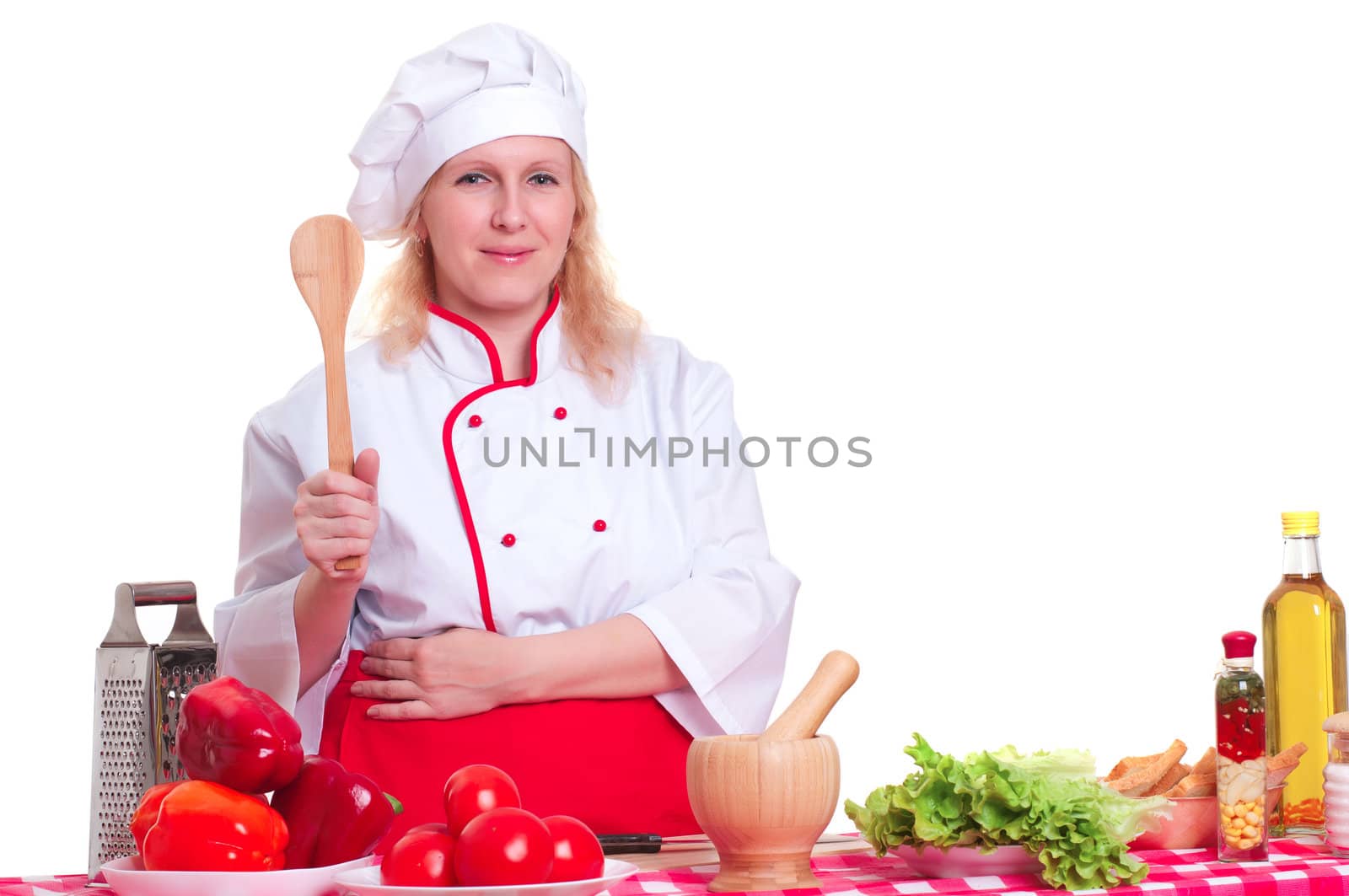 female chef holding a spatula for cooking