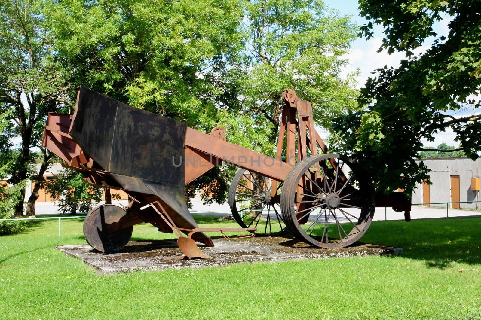 The big metal plough on steel wheels