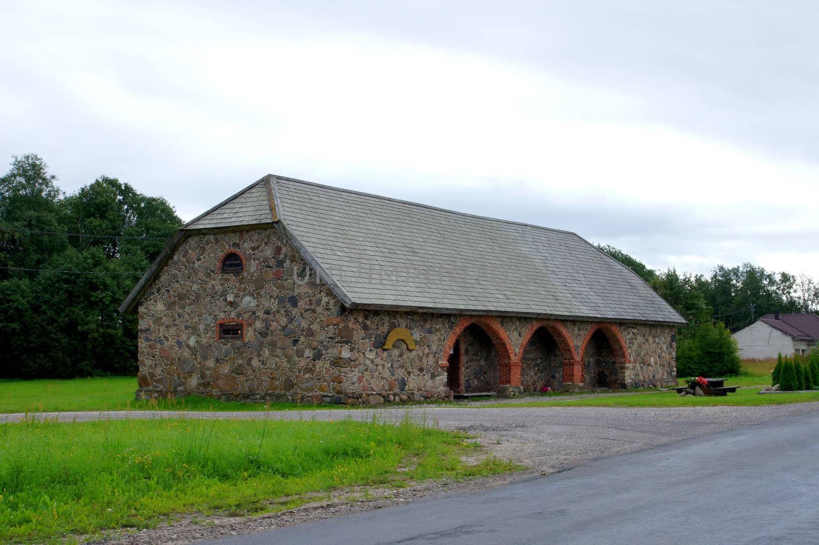 The old stone house on a background of sky