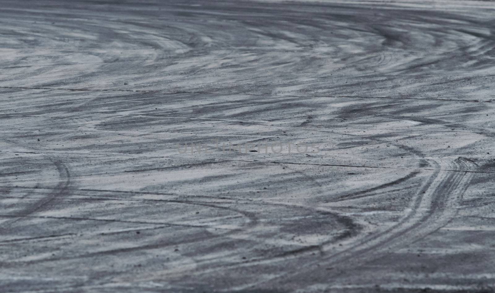 Background with tire marks on road track