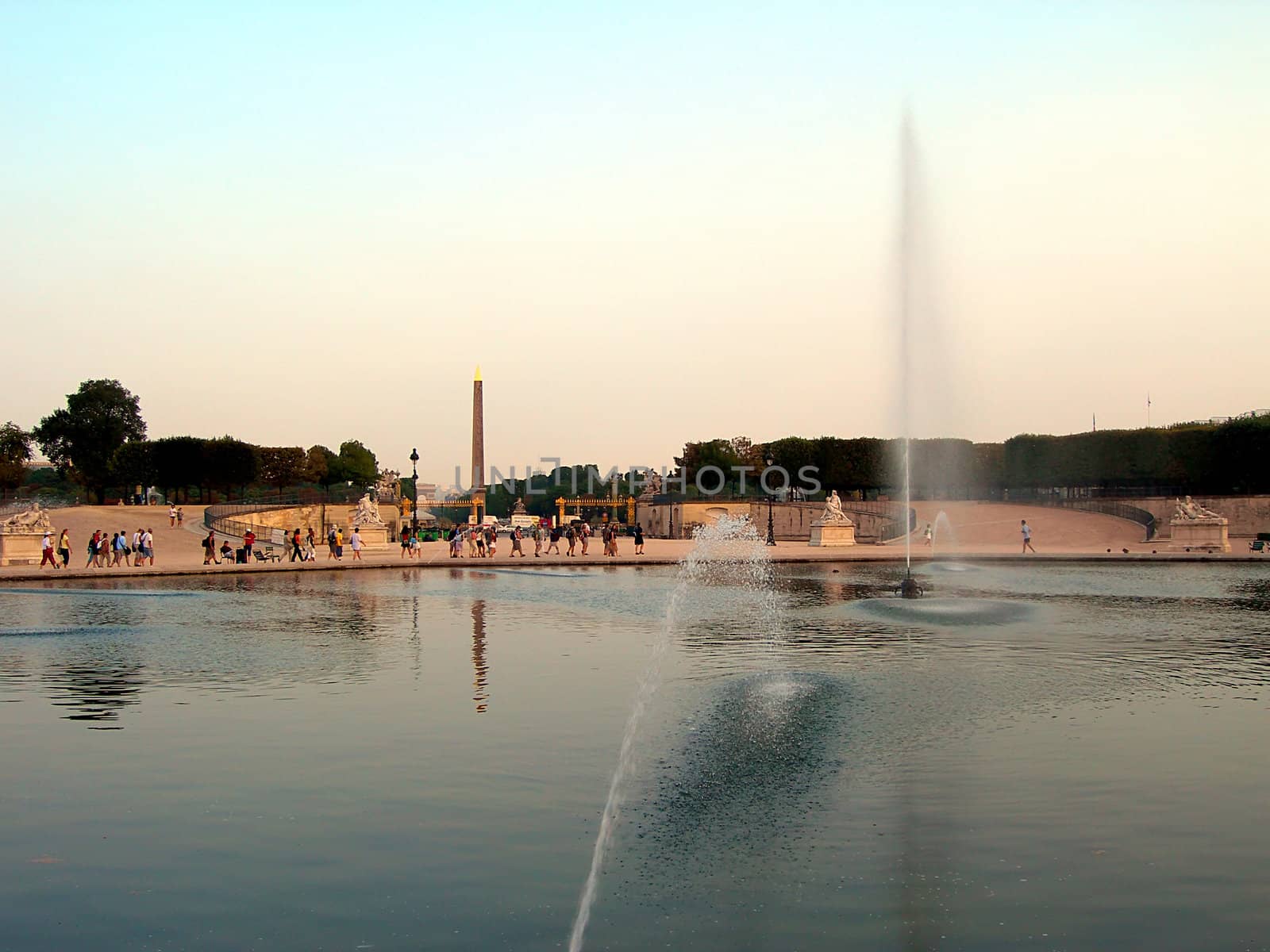  Spraying water near famous Concorde square with obelisk in Paris in France