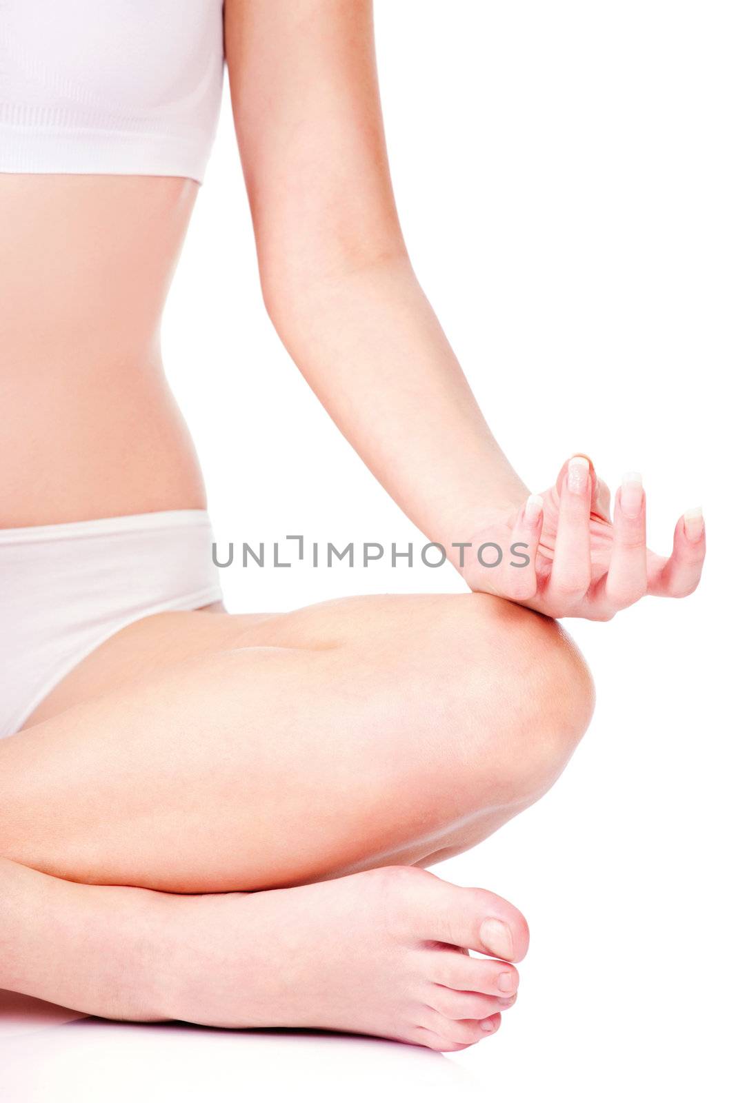 detail of woman in underwear meditate, isolated on white. Health concept 