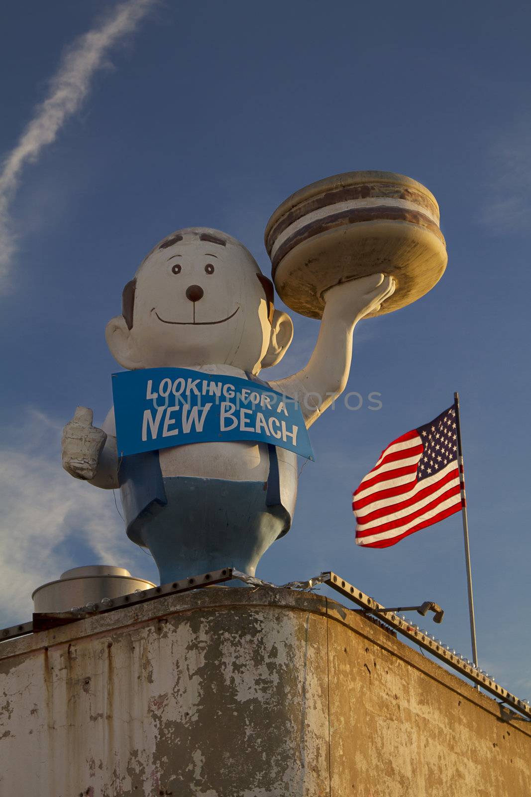 Burger boy on top of roof at Coney Island