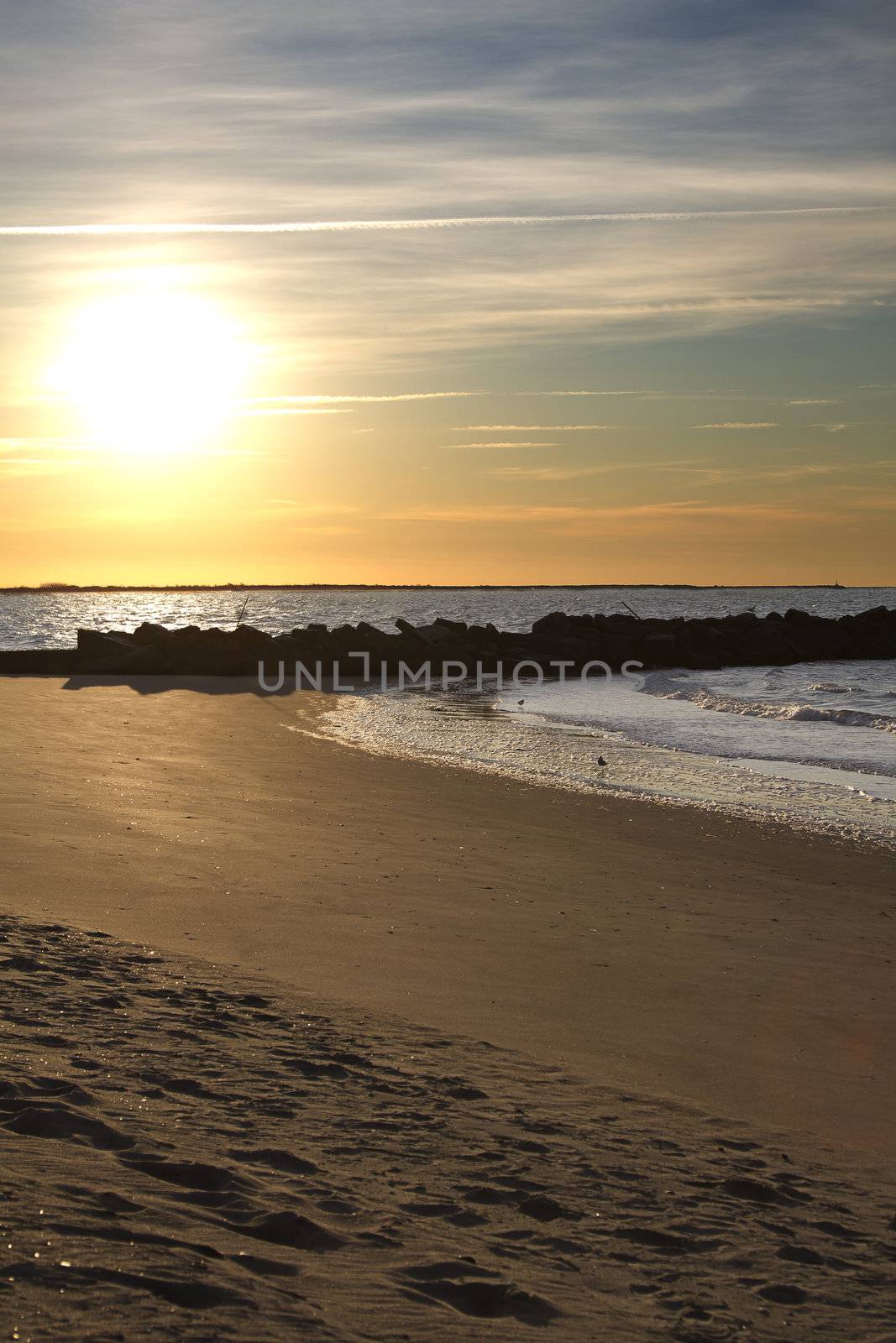 Sunrise over the Coney's island beach in november