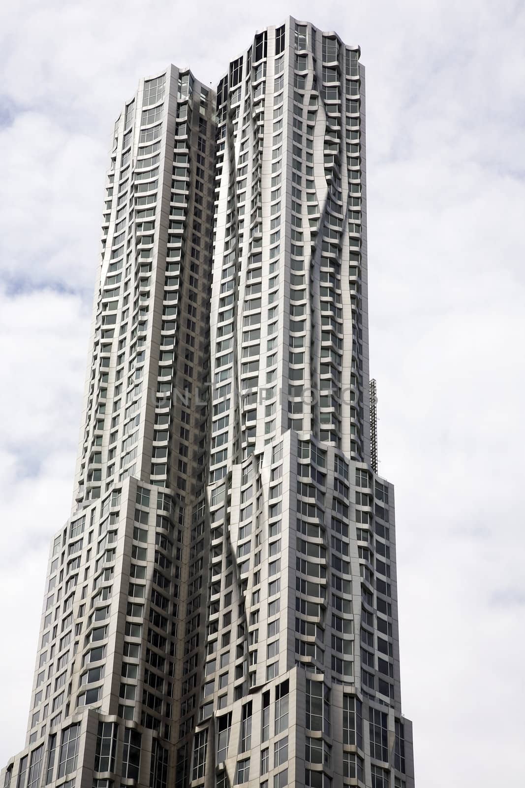 NEW YORK CITY - MAY 24, 2011: Frank Gehry's Beekman Tower contains luxury apartments and stands as the 8th tallest building in the city.