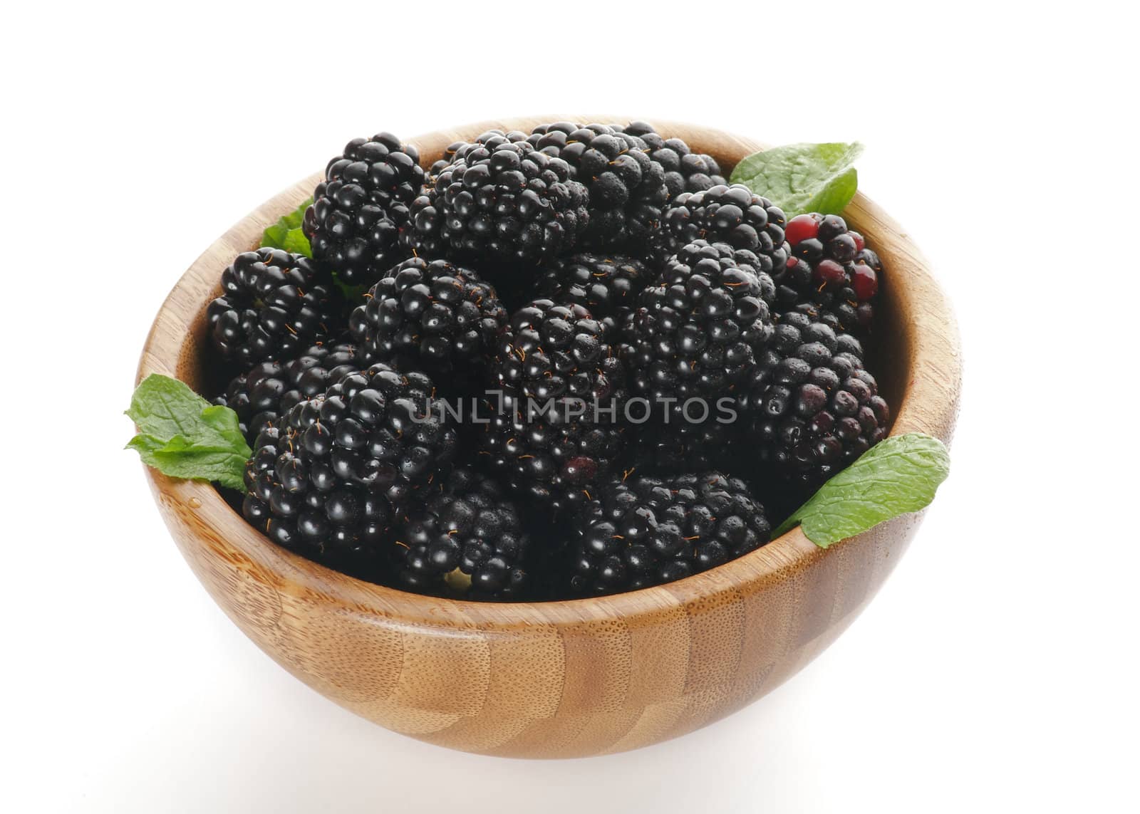 Ripe Blackberries in Wooden Bowl by zhekos