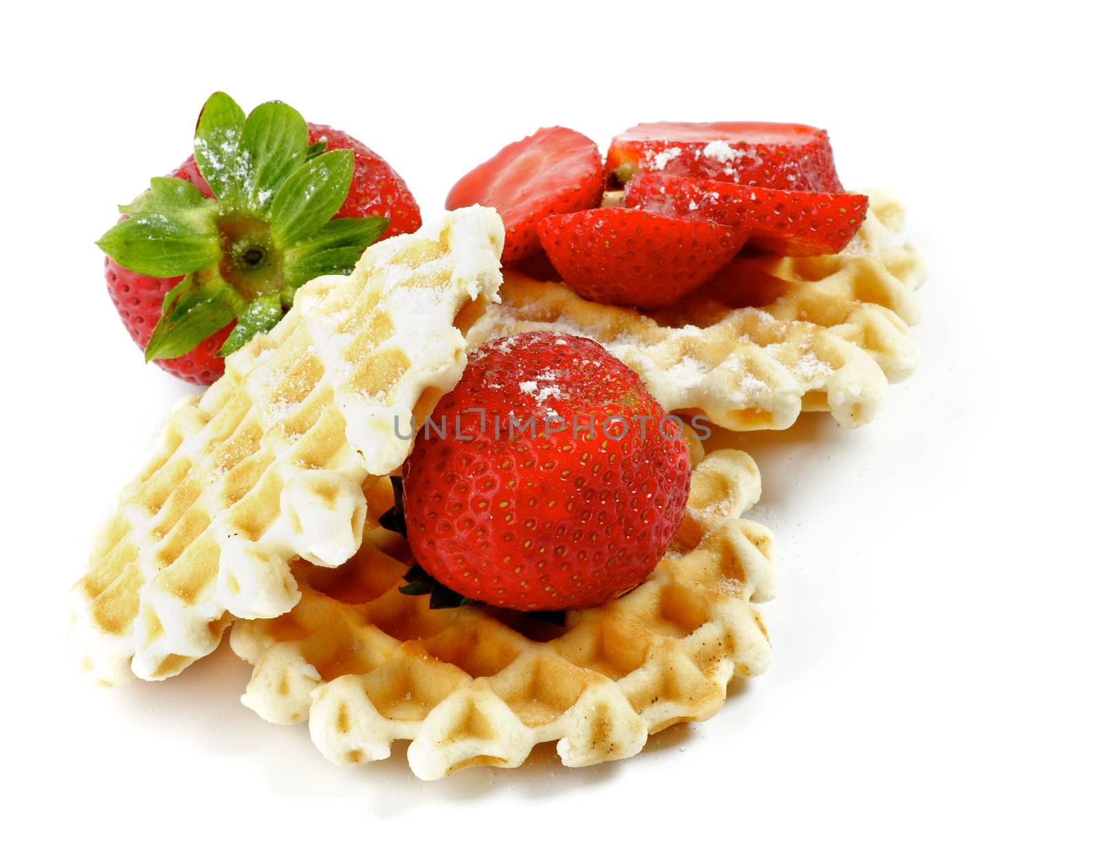 Delicious Waffles and Perfect Strawberries with Sugar Powder isolated on white background