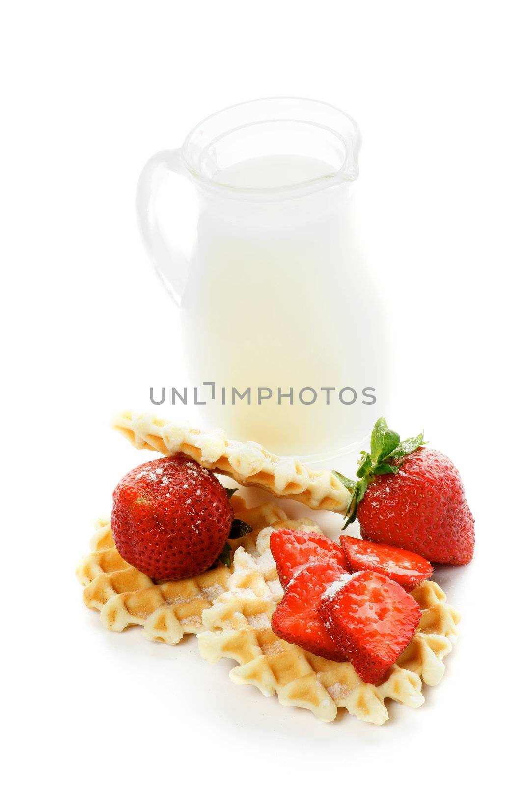 Delicious Waffles, Perfect Strawberries with Sugar Powder and Milk Jug isolated on white background