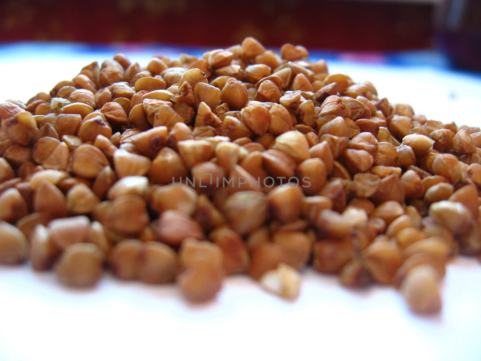 Grains of buckwheat on a white background