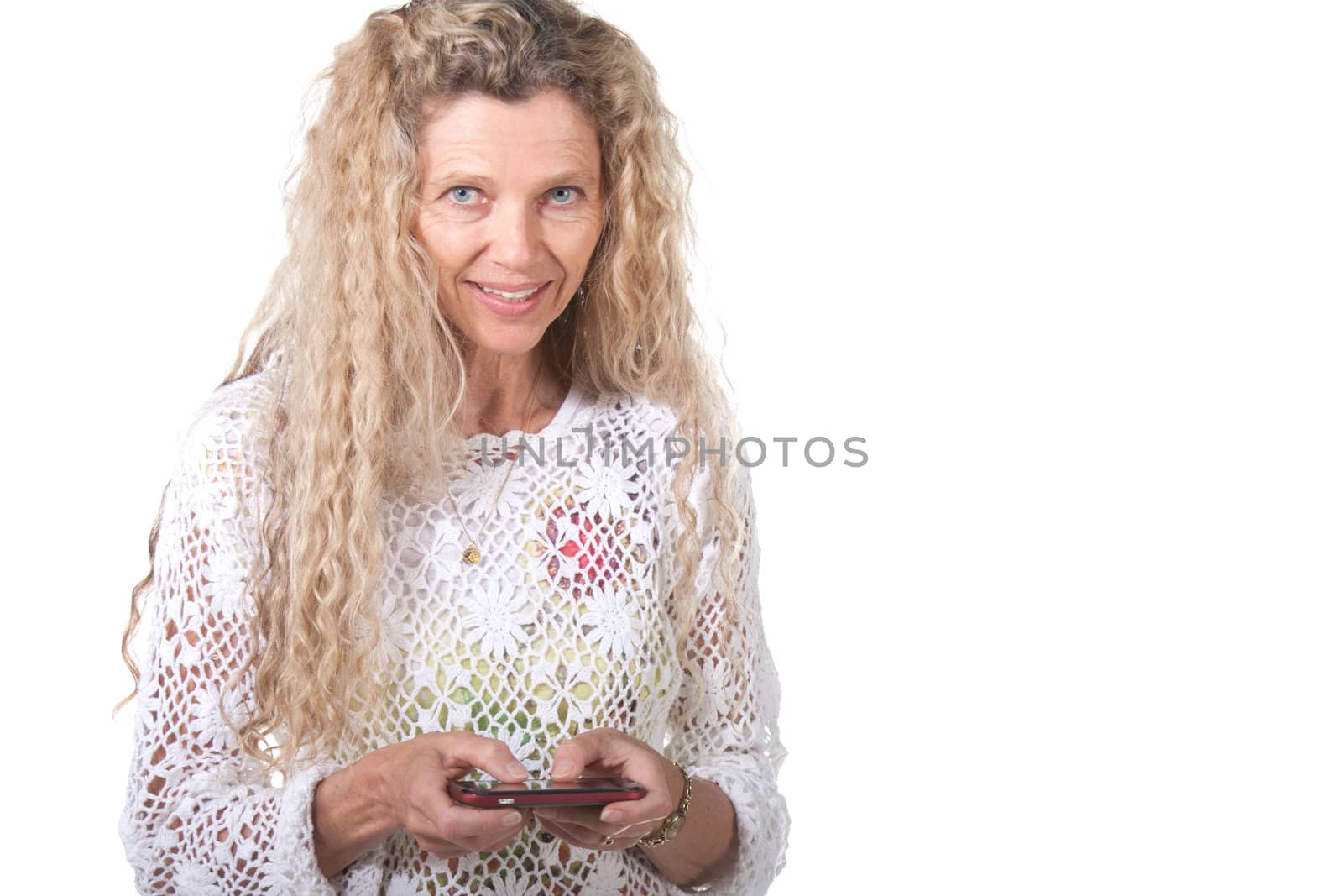 mature woman texting on smart cell phone
