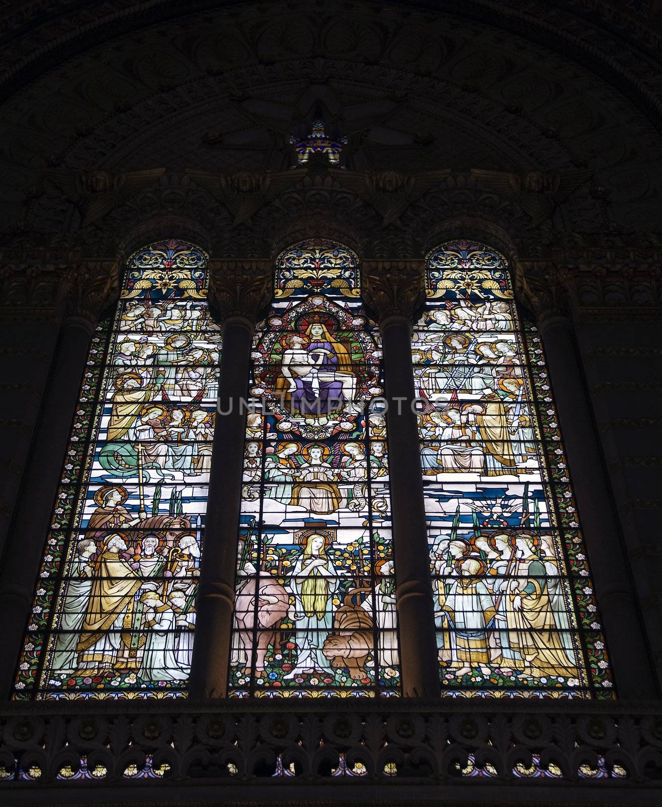 Stained glass window in the Cathedral Basilique Notre-Dame de Fourvière in Lyon France.