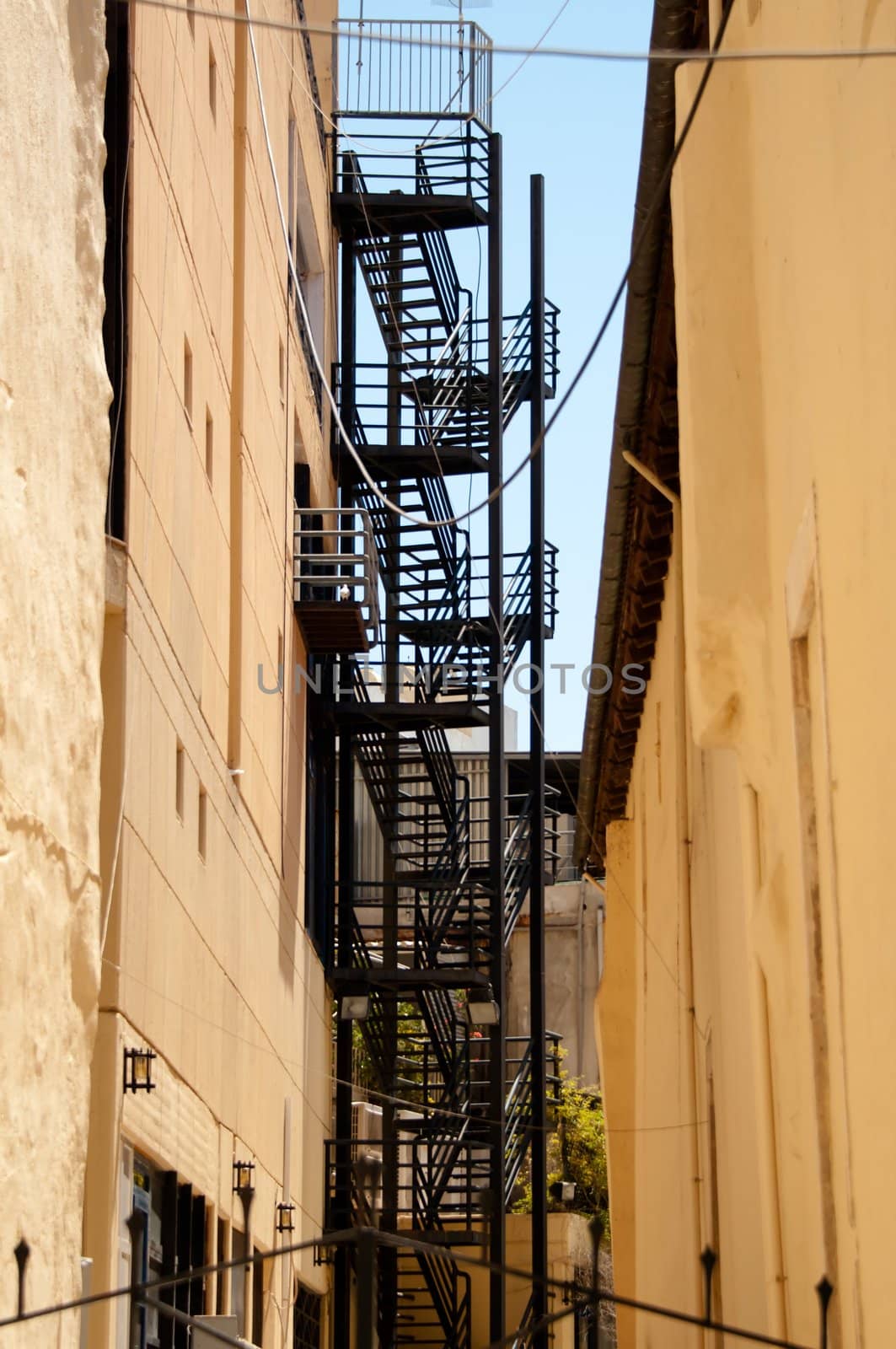 fire escape staircases between two buildings on Crete Island in Greece