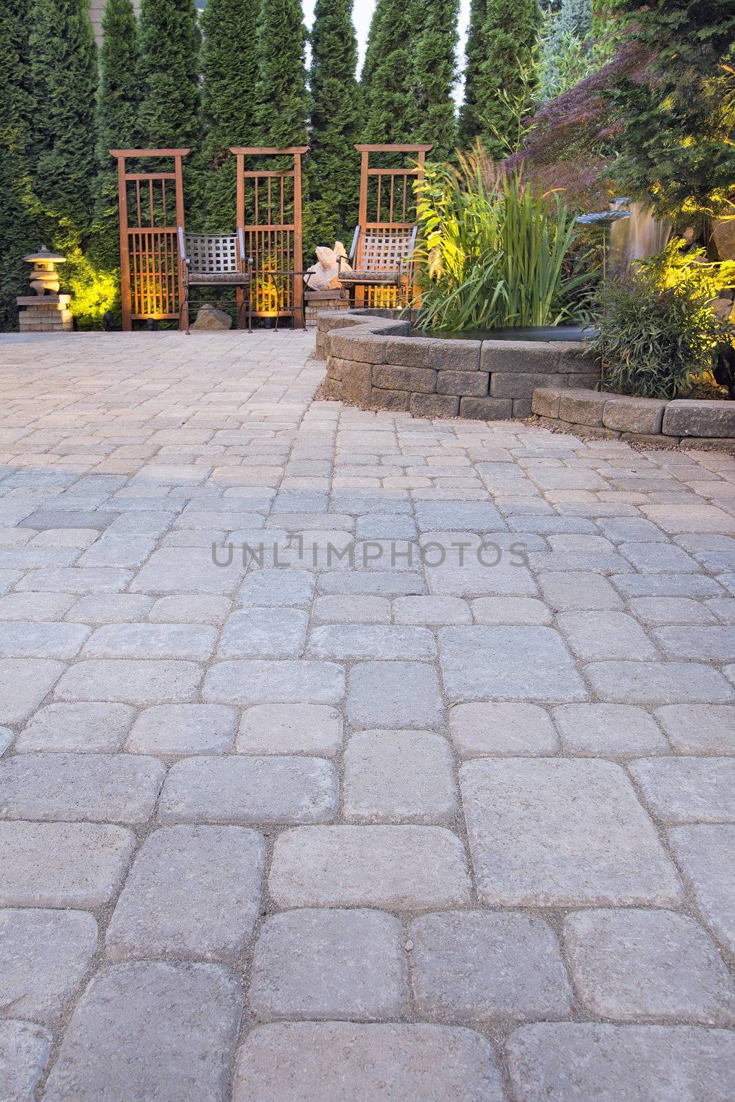 Garden Paver Patio with Trellis Japanese Stone Lantern Pagoda Waterfall Pond and Landscaping Lights