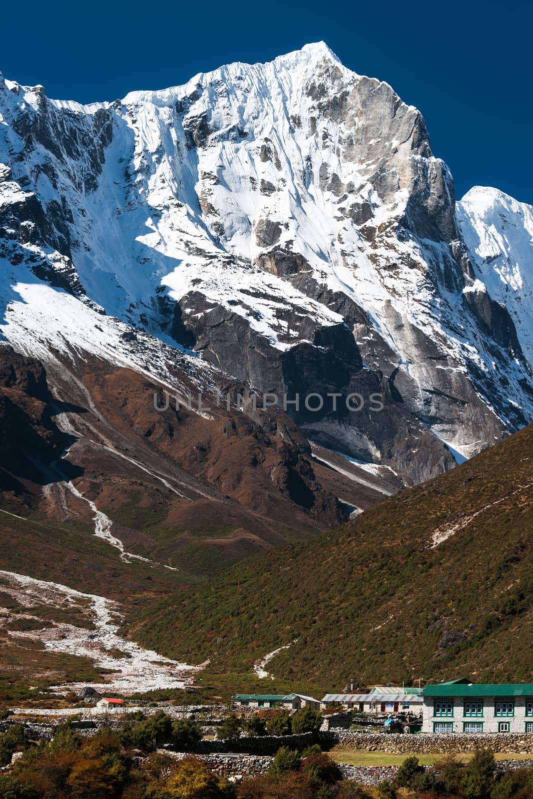 Village with hotels and lodge for tourists in Himalayas. Travel to Nepal