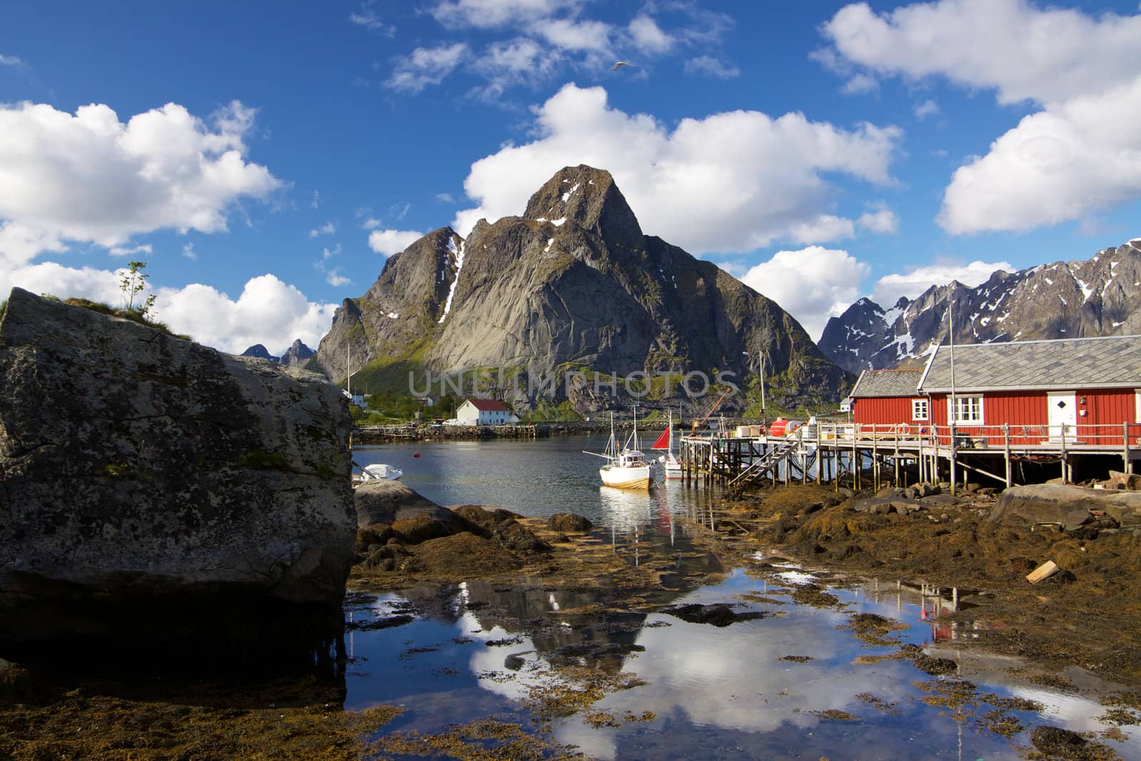 Picturesque fishing town of Reine by the fjord on Lofoten islands in Norway