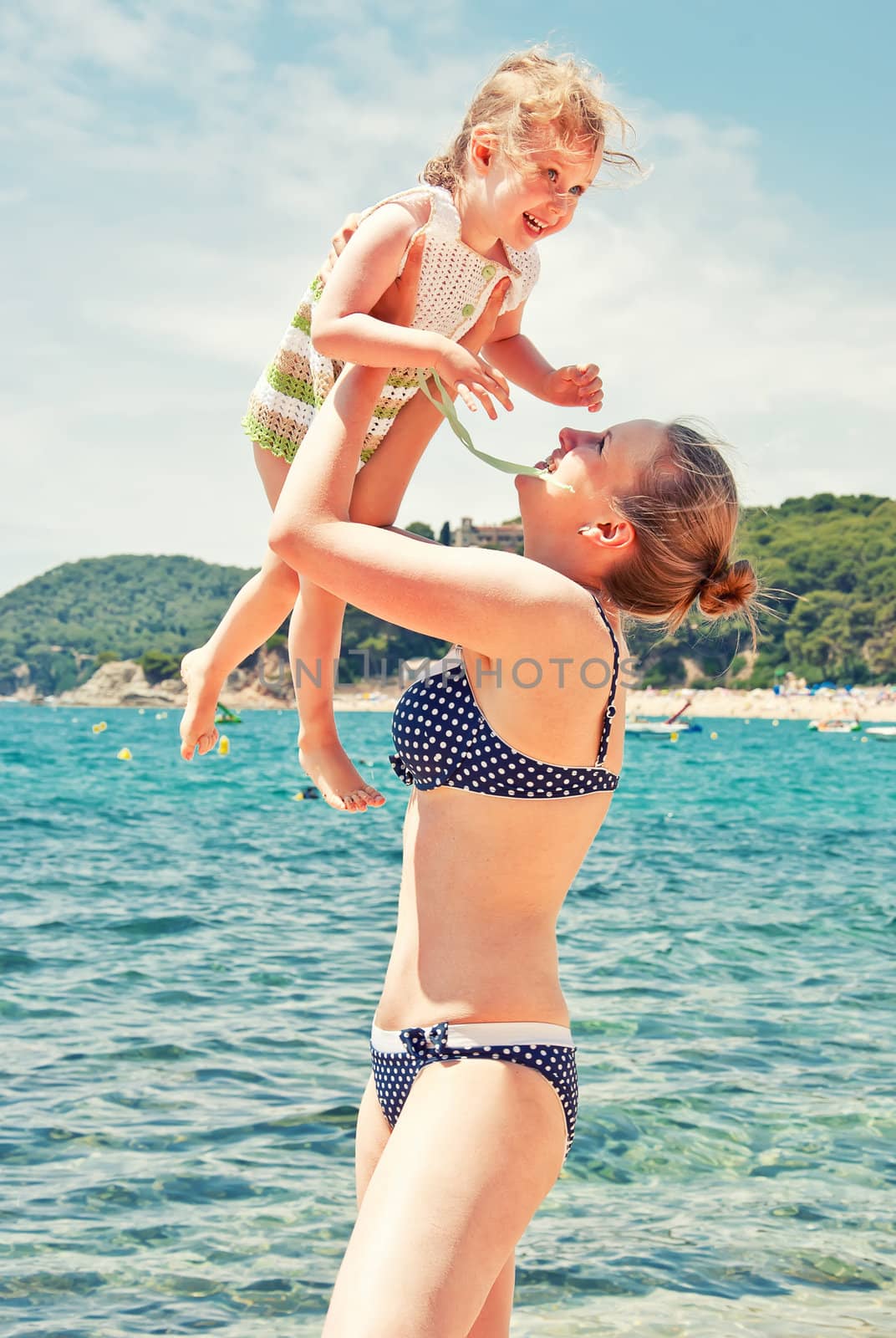 Cute little girl having fun in the sea