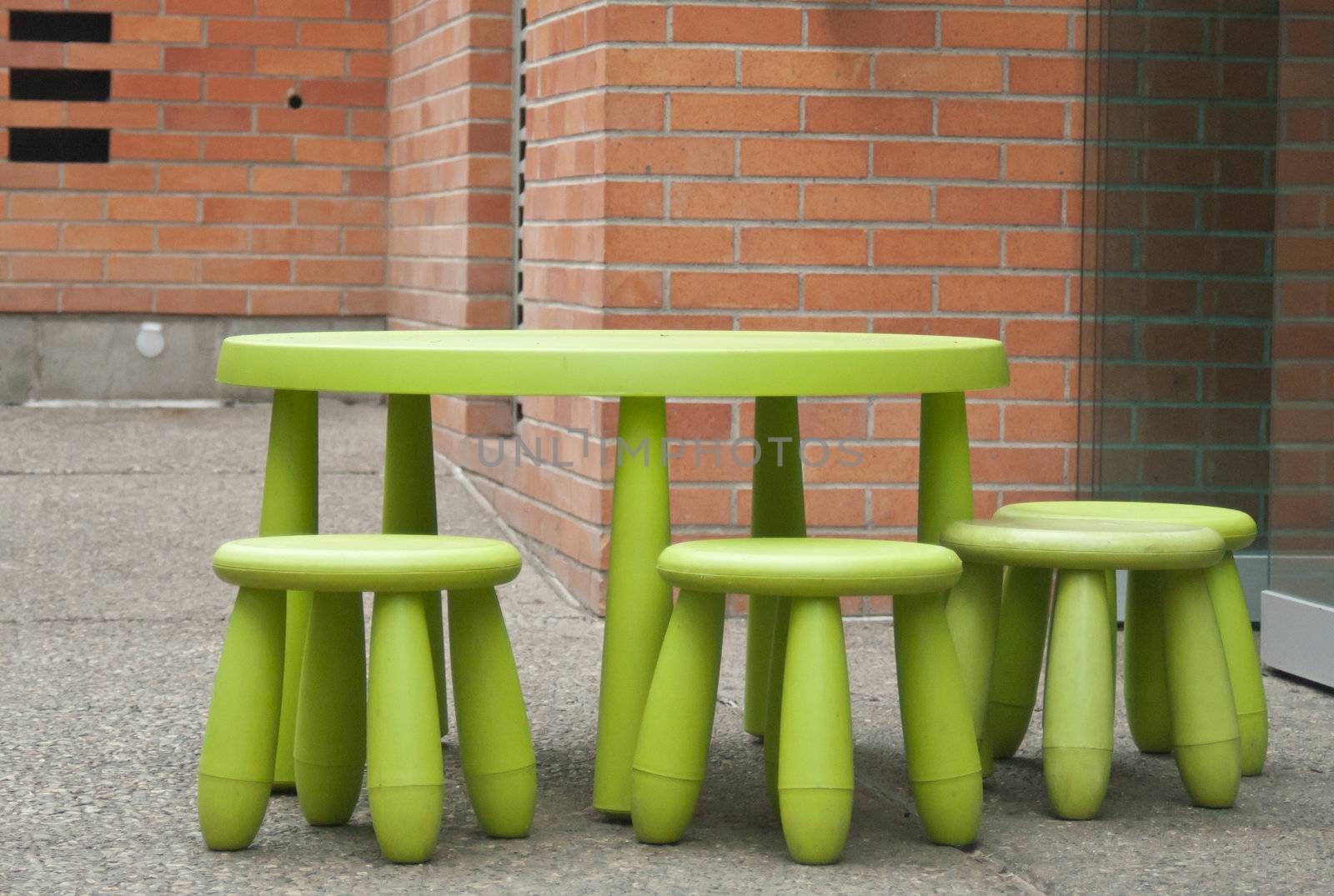 A bright and bold play table for kids in granny apple green.