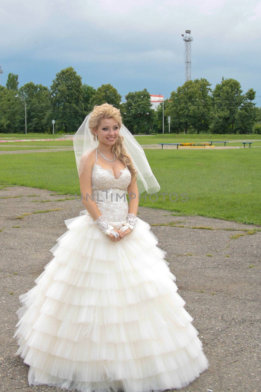 The young beautiful wife in the wedding day