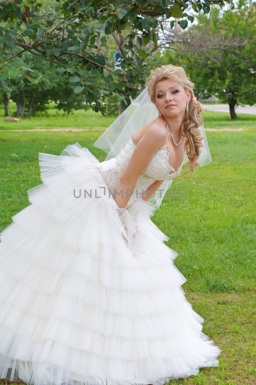 The young beautiful wife in the wedding day