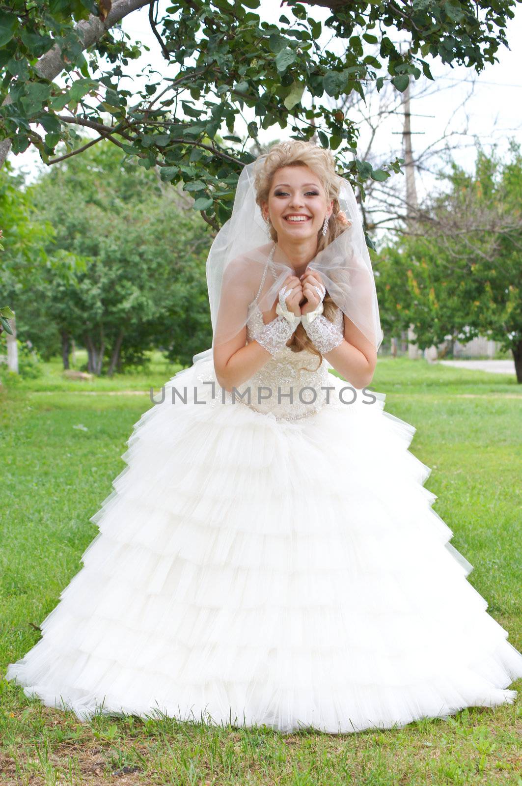 The young beautiful wife in the wedding day