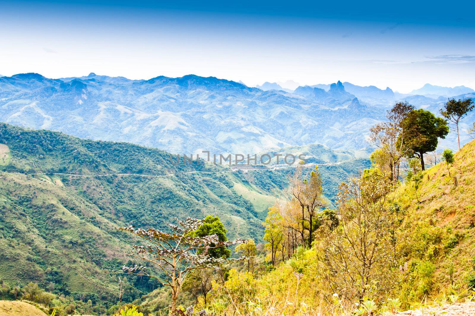 View on the mountain. Saw several mountain peaks. It is one of the suburban landscape in Laos.