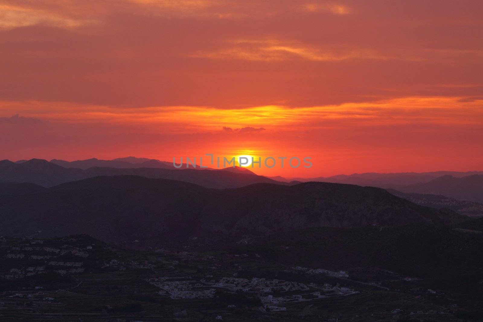 Summer landscape in mountains with the sun