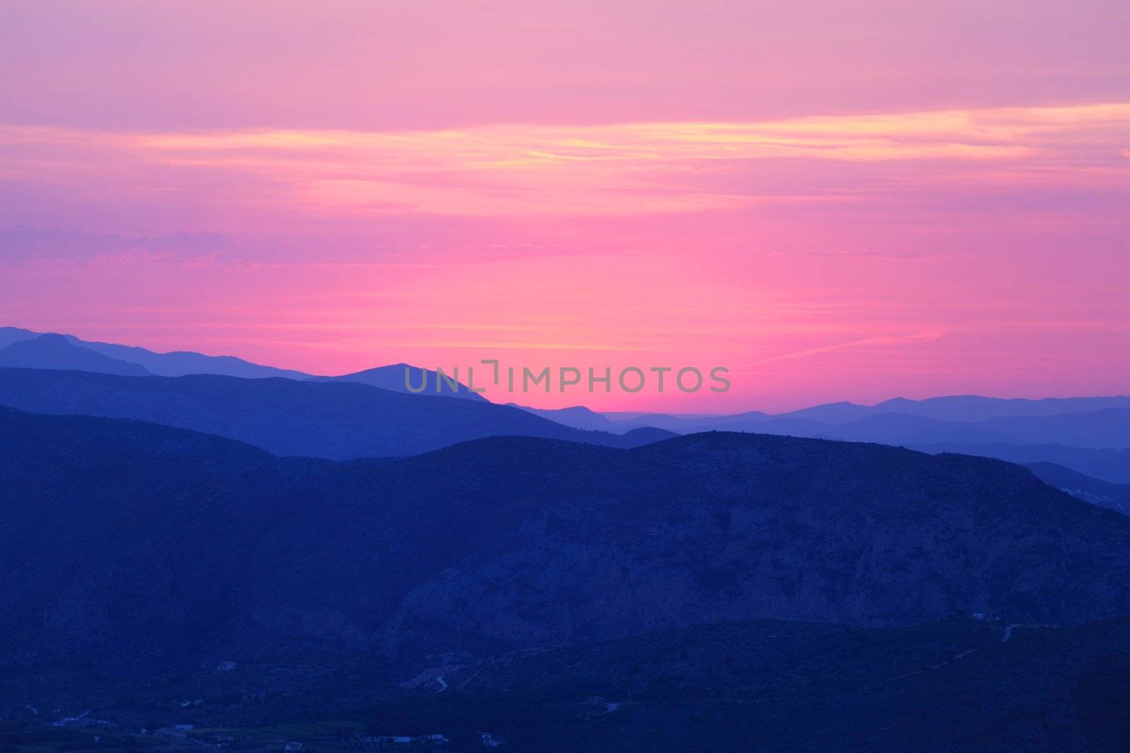 Summer landscape in mountains with the sun