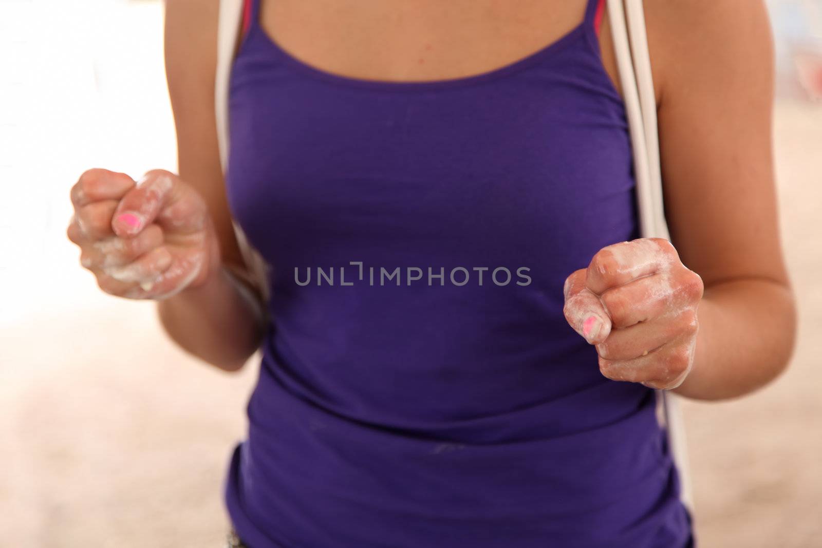 Girl's hands covered with ice cream after ice-cream eating contest at a County Fair