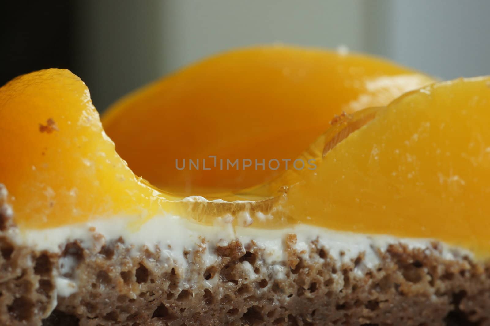 the chocolate biscuit with a peach close up