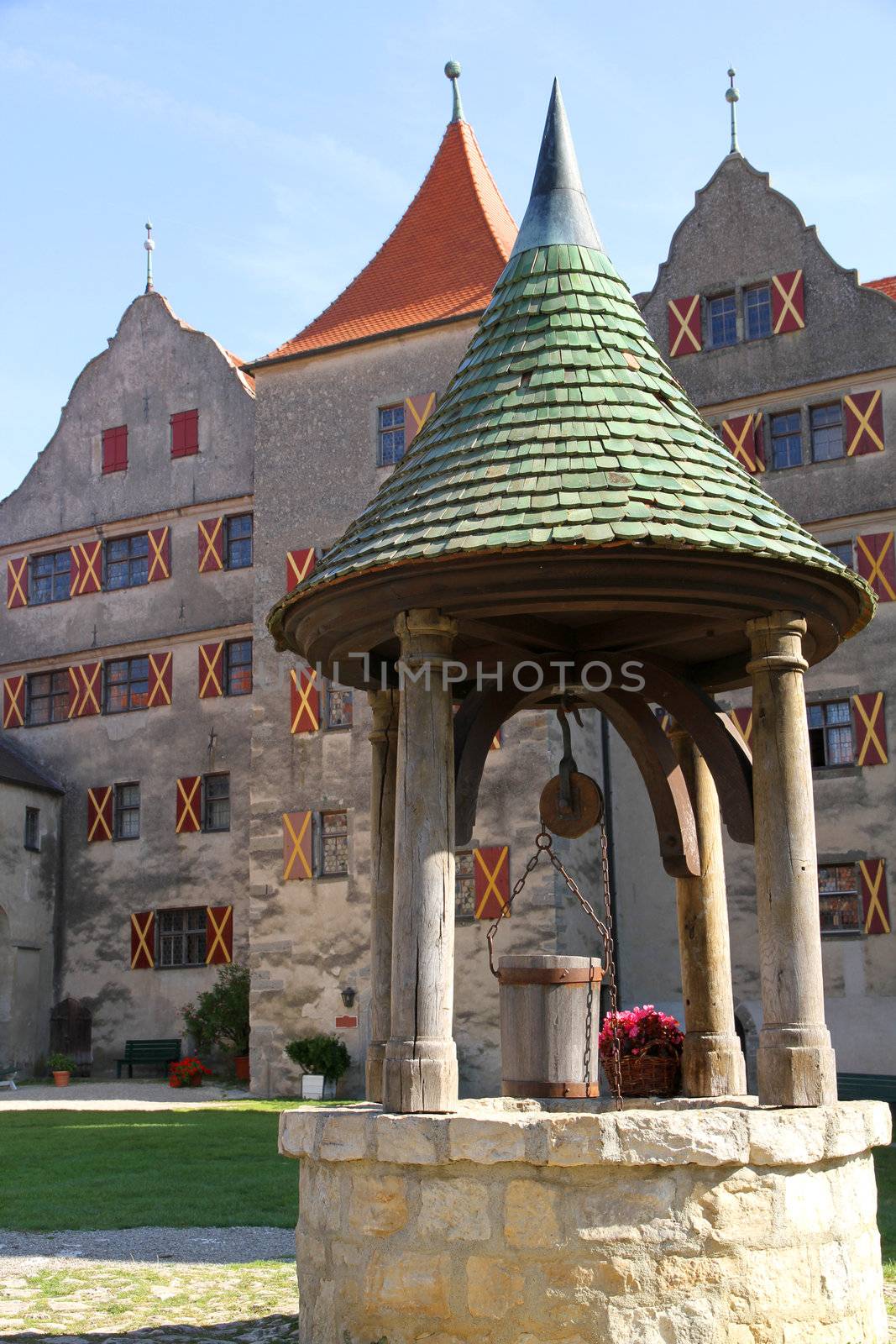 A fountain in the Castle Harburg in Bavaria, Germany, Europe.