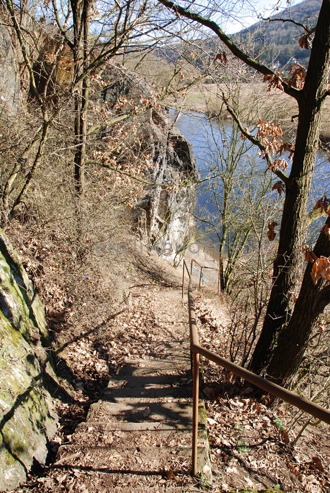 Narrow stair path leads through the wild rock