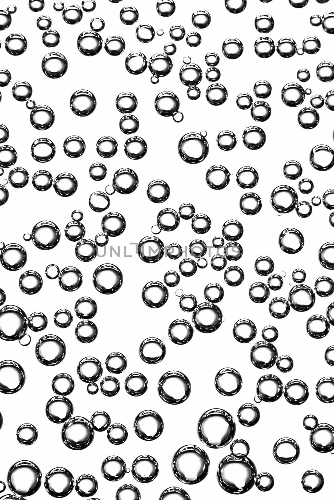 Group of bubbles formed on a glass.