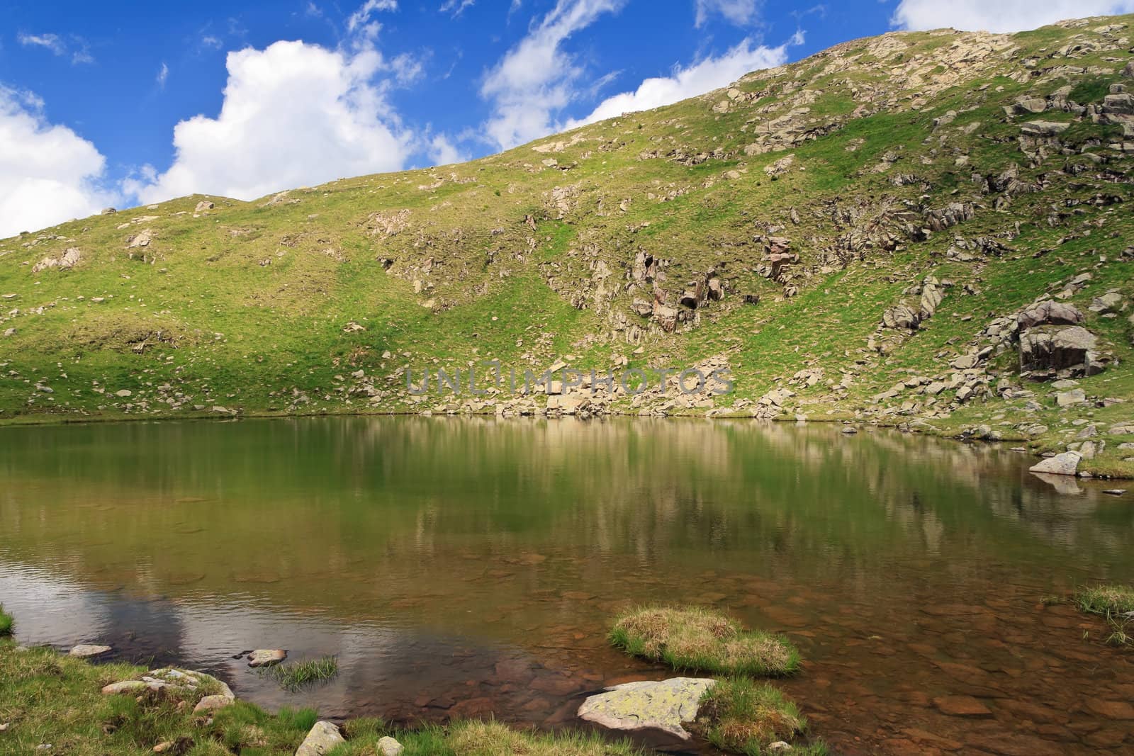 summer view of Lusia lake, in val di Fassa, Italian dolomites