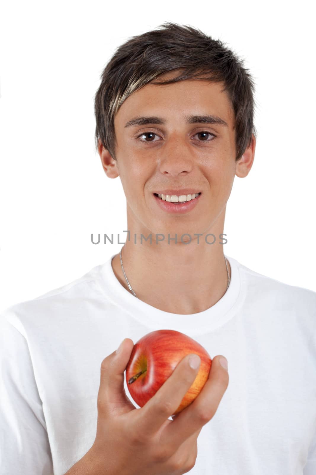 young swarthy man with  brown eyes and a red apple in his hand on white background