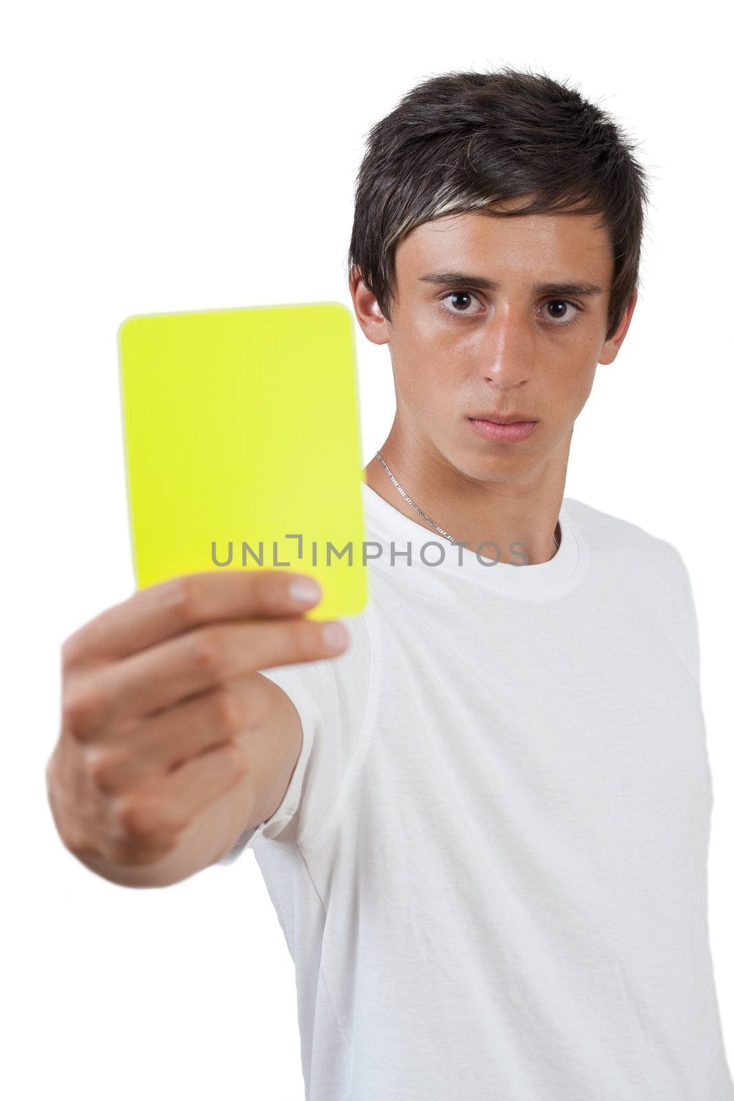 young swarthy man with  brown eyes showing yellow card