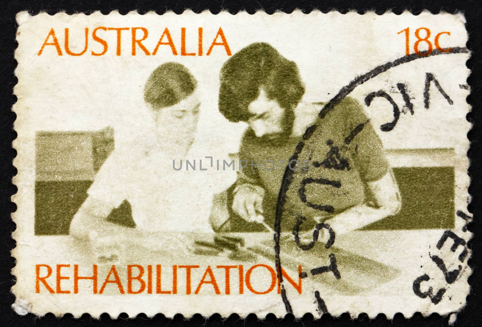 AUSTRALIA - CIRCA 1972: a stamp printed in the Australia shows Amputee Assembling Electrical Circuit, Rehabilitation of the Handicapped, circa 1972