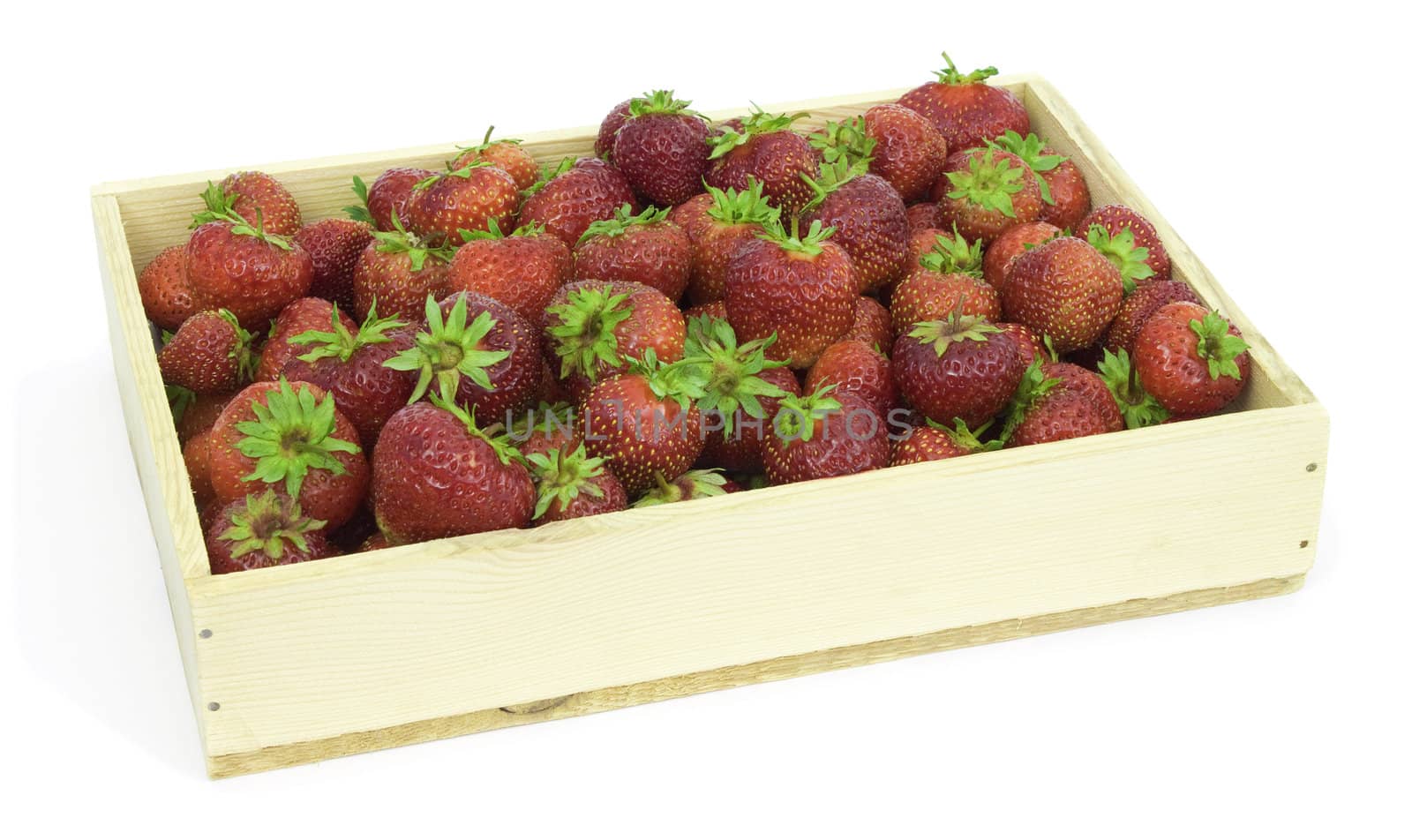 Many ripe strawberry  collected in wooden box