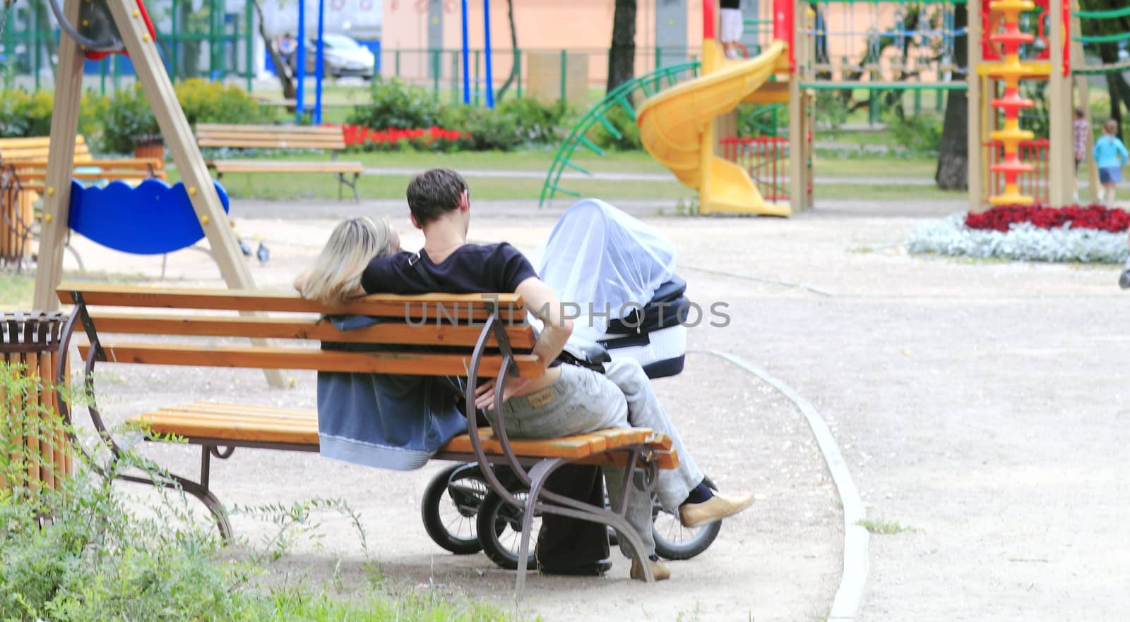 People with children resting in the park
