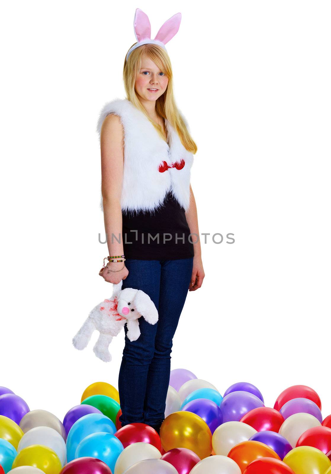 A young woman with a toy rabbit isolated on white background
