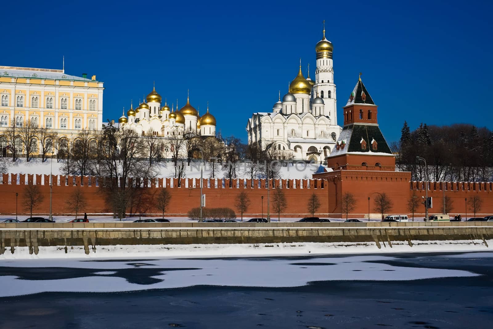 The red brick walls of famous Kremlin in Moscow with its churches