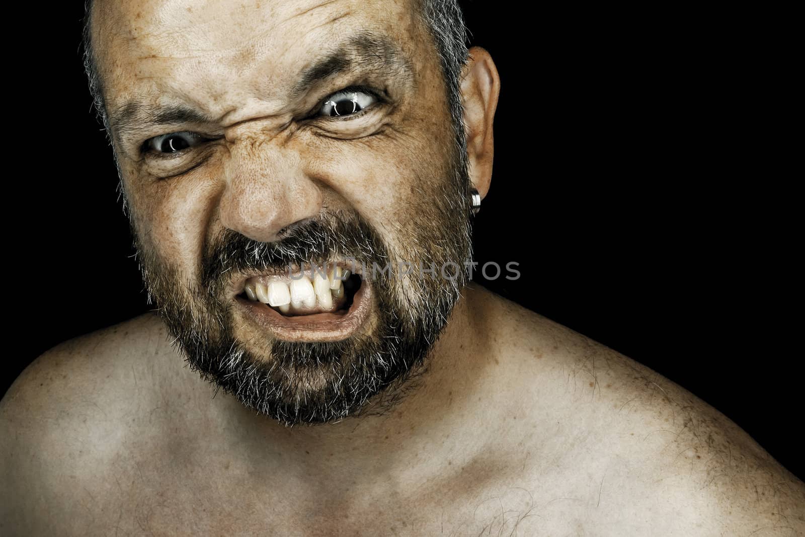 angry man with beard by magann