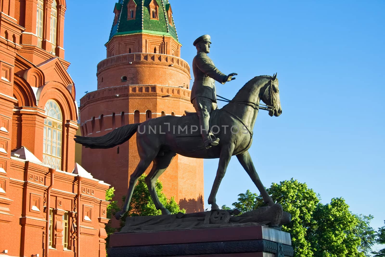 Statue of marshal Zhukov with History and Kremlin tower, Moscow, Russia